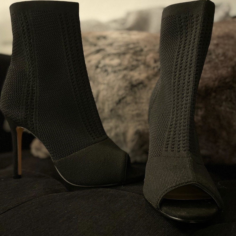 BRAND NEW. NEVER BEEN WORN. Peep-toe sexy boot